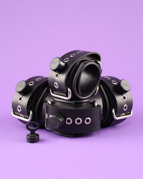 Starting Rubber Restraint Set with metallic buckles and matching Magnetic Key and Monogrammed Rubber Elite Caps